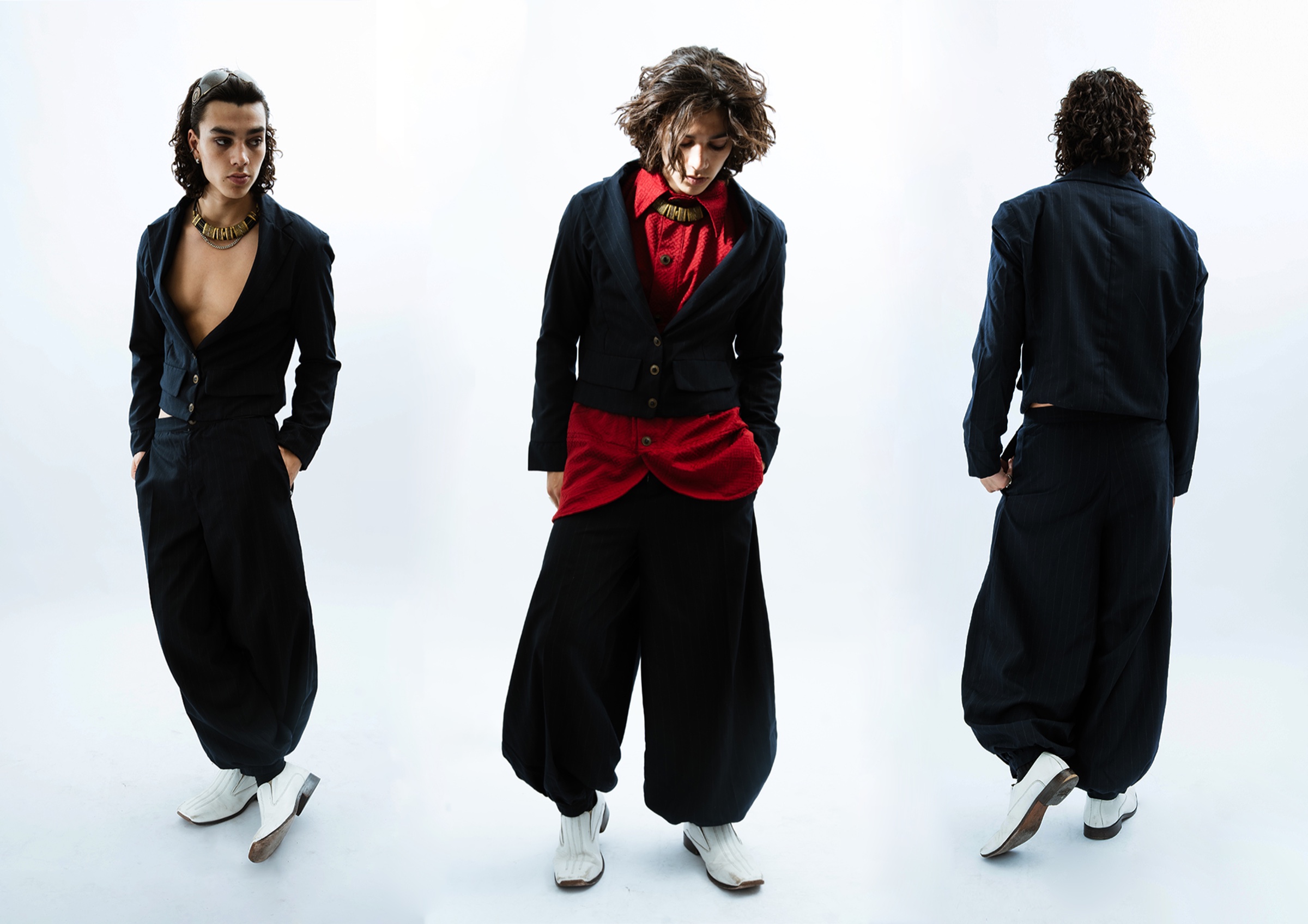 Three views of sculptural black and red tailoring on white